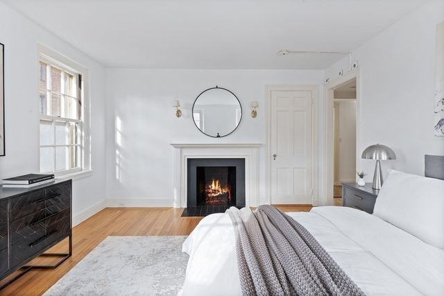 a bathroom with a sink vanity and mirror