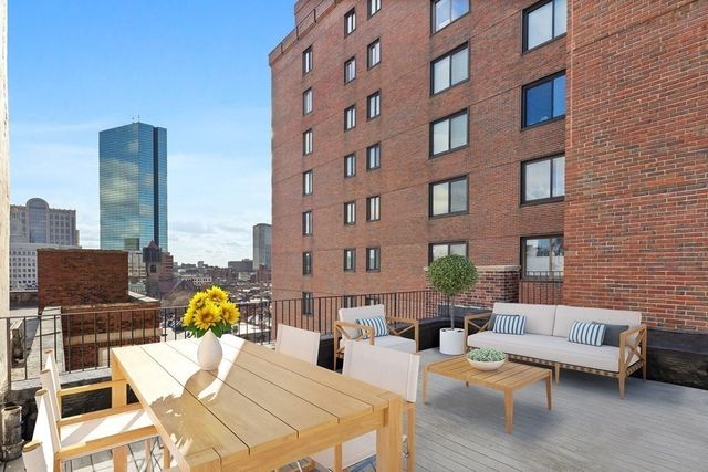 a view of terrace with seating space and stairs