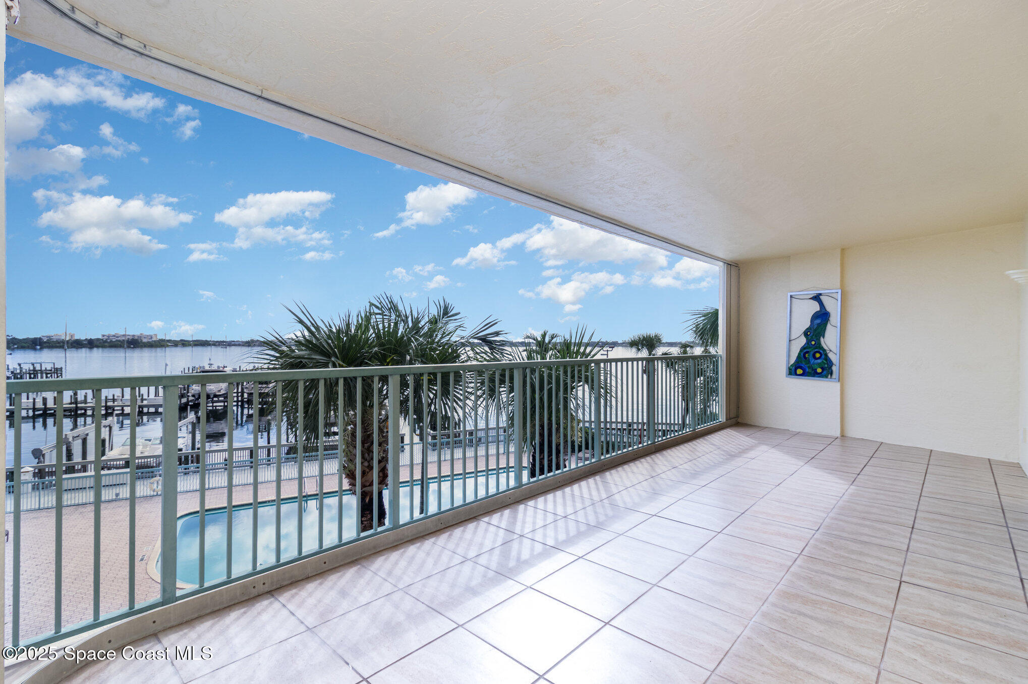 102 Riverside Drive, Unit 203 Cocoa, FL 32922 - Photo 2 of 26 a view of a balcony