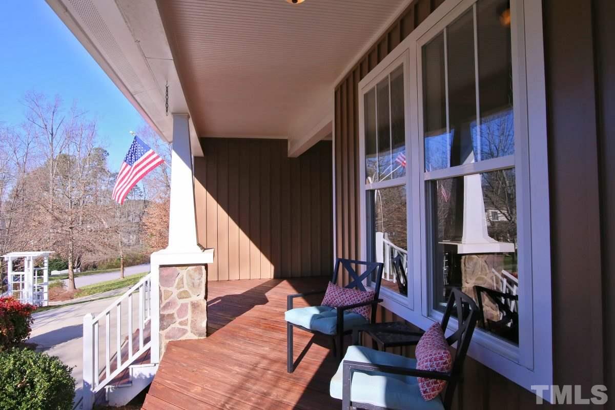 1128 Coram Fields Road Wake Forest, NC 27587 - Photo 3 of 25 Enjoy relaxing on this fabulous front porch!