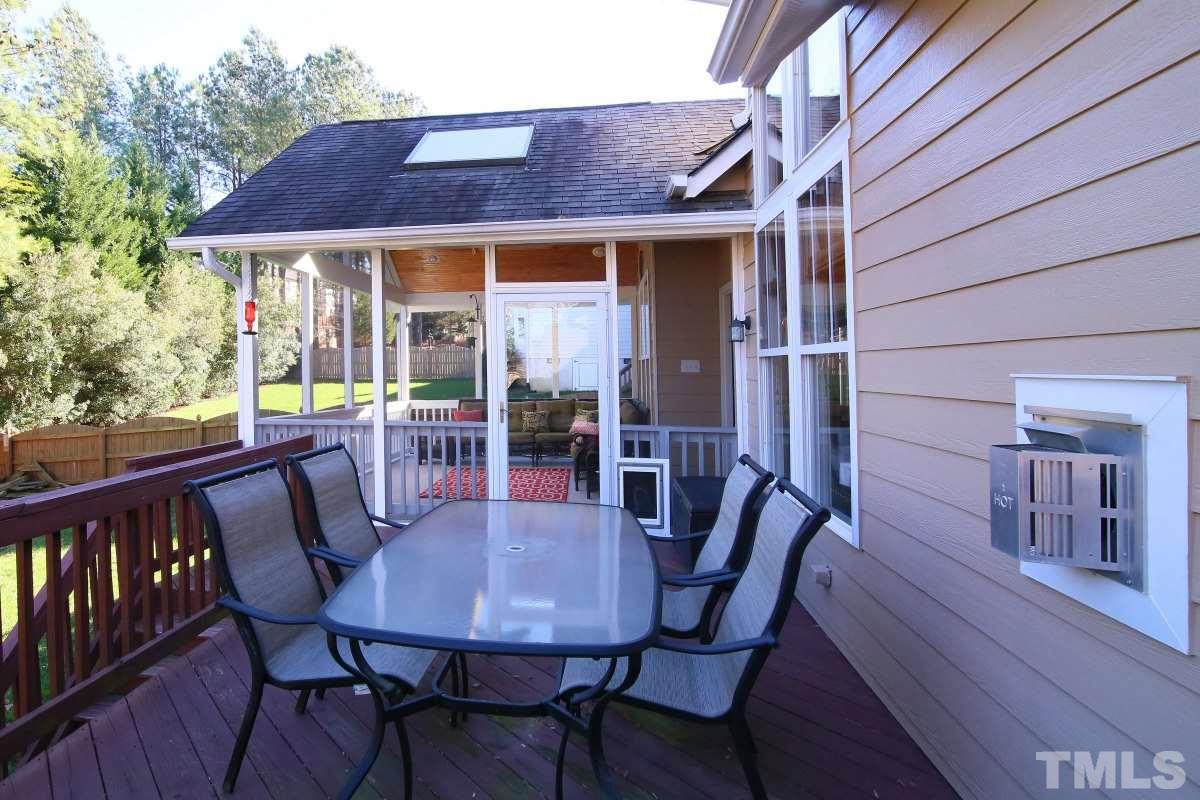 1128 Coram Fields Road Wake Forest, NC 27587 - Photo 22 of 25 More outdoor living space! This large deck is great for entertaining or having dinner!