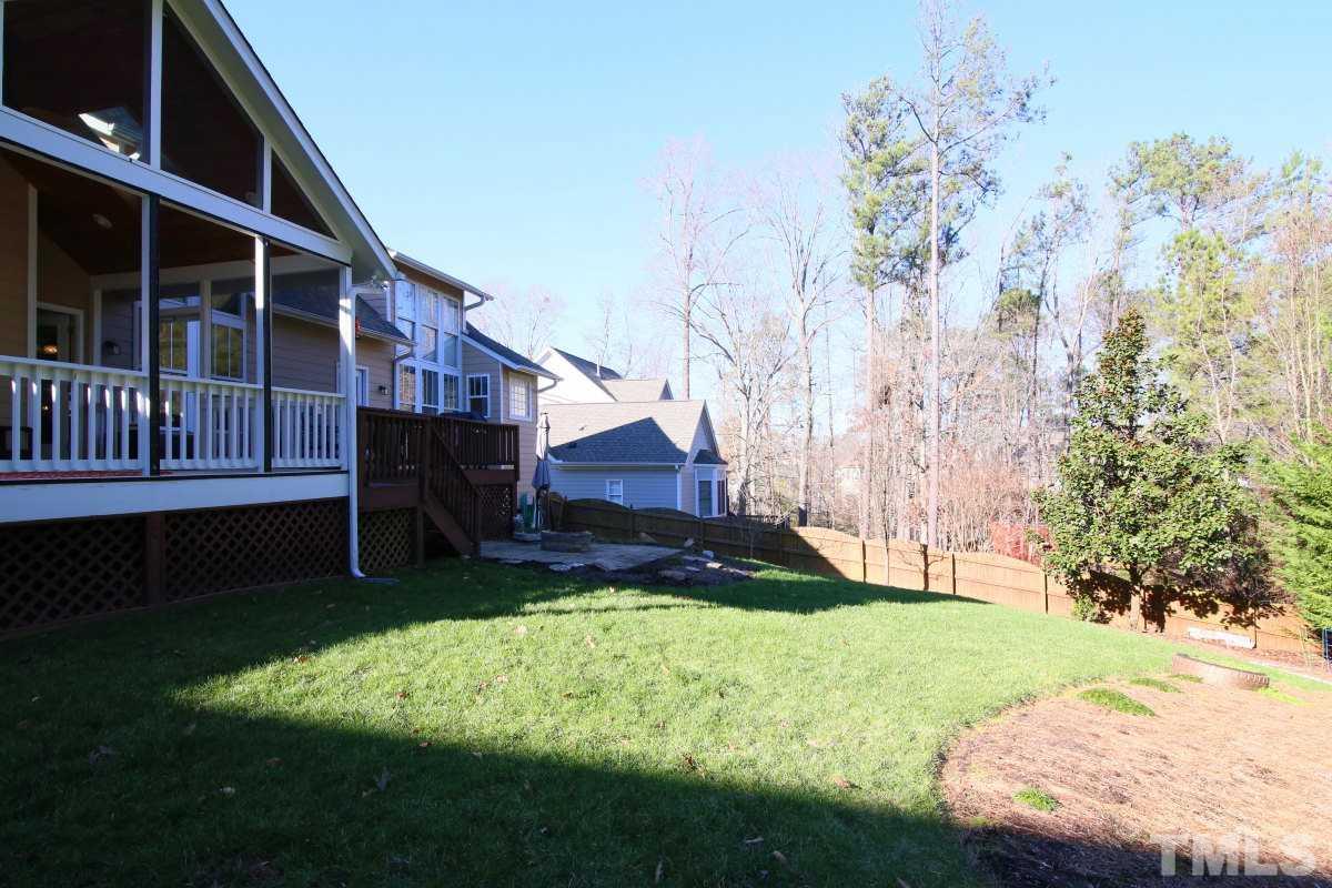 1128 Coram Fields Road Wake Forest, NC 27587 - Photo 24 of 25 Enjoy this fenced, large well landscaped yard!
