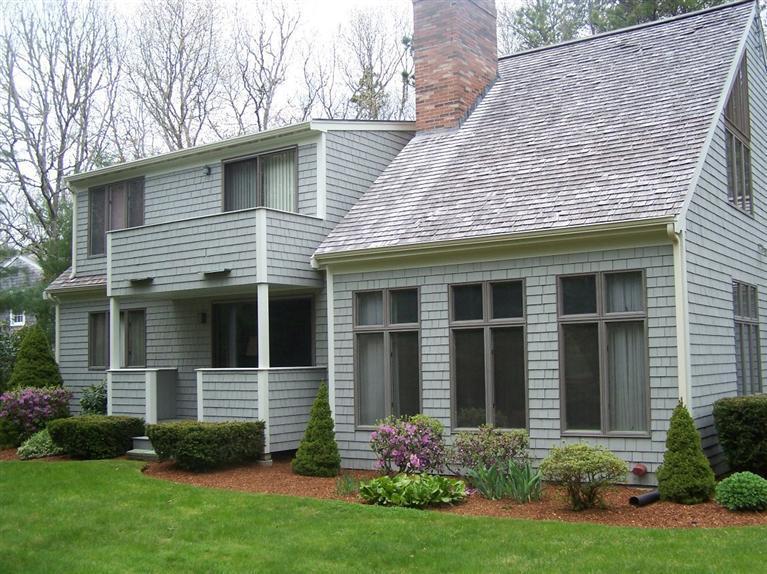 81 Leonard Road Osterville, MA 02655 - Photo 9 of 19 a front view of a house with garden