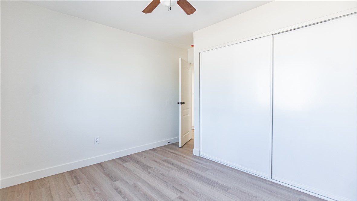 9293 Guava Avenue Hesperia, CA 92345 - Photo 15 of 32 a view of small space with wooden floor