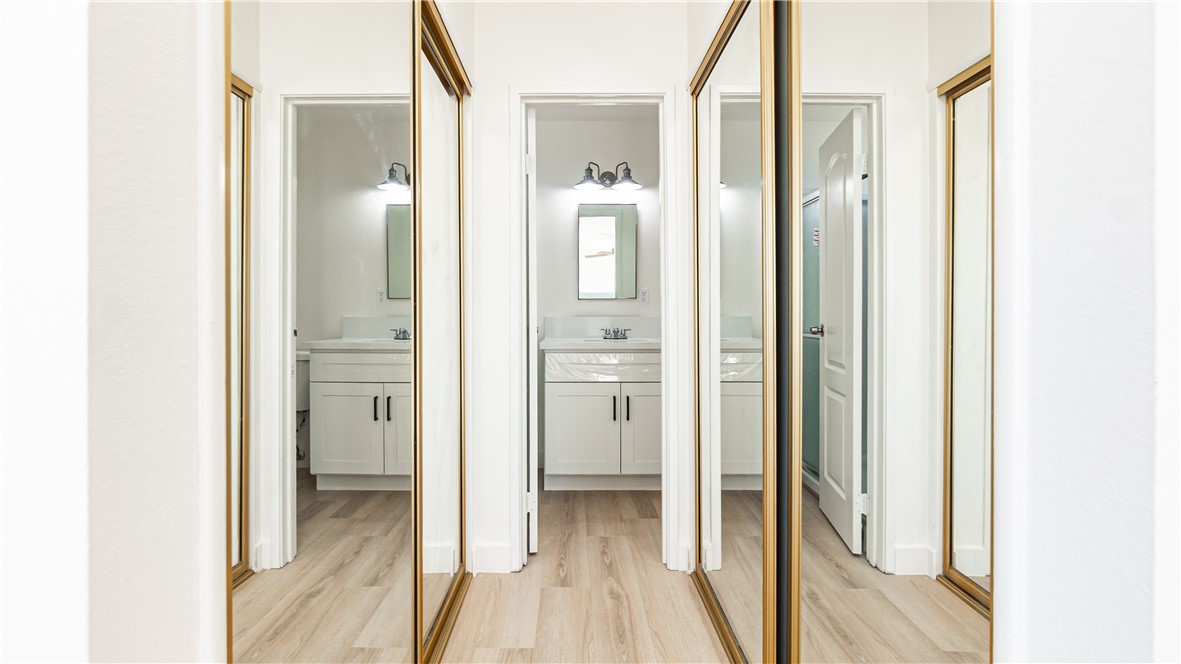 9293 Guava Avenue Hesperia, CA 92345 - Photo 18 of 32 a view of a bathroom from a hallway