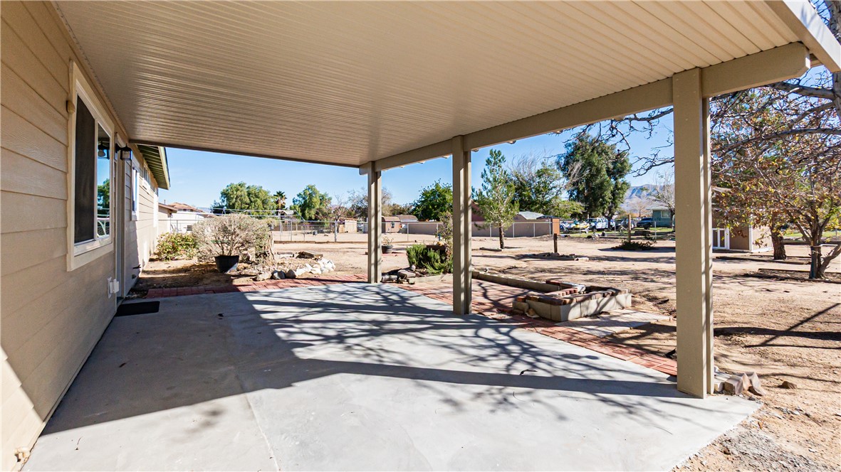9293 Guava Avenue Hesperia, CA 92345 - Photo 21 of 32 a view of a porch with wooden floor