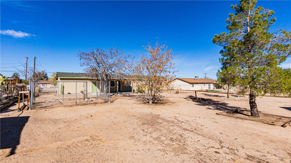 9293 Guava Avenue Hesperia, CA 92345 - Photo 28 of 32 a view of a house with a snow in the yard