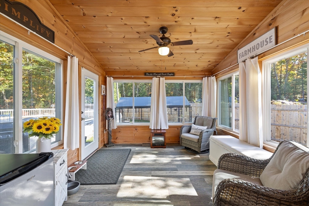 27 Ware Drive Templeton, MA 01436 - Photo 11 of 34 a living room with furniture and large windows