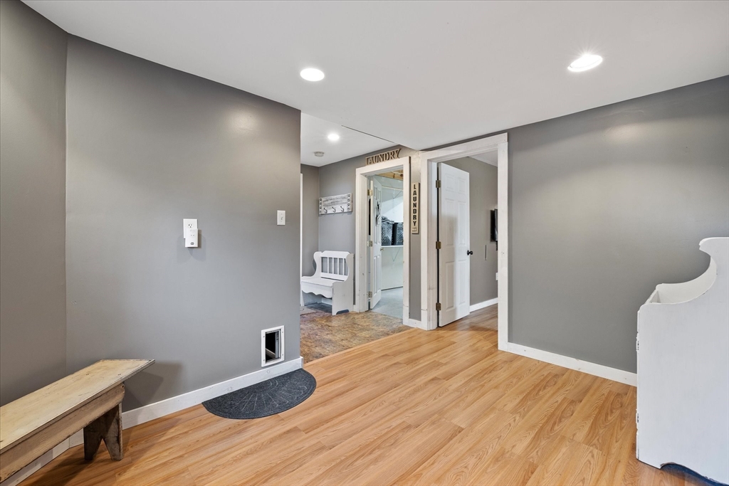 27 Ware Drive Templeton, MA 01436 - Photo 19 of 34 a big room with wooden floor and bathroom