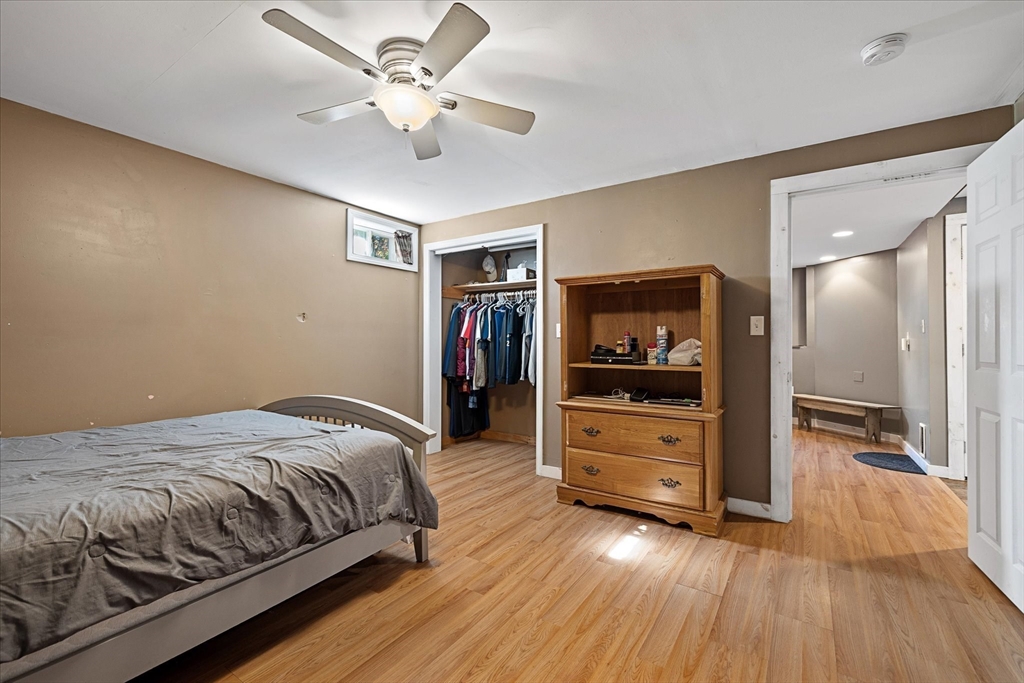 27 Ware Drive Templeton, MA 01436 - Photo 21 of 34 a bedroom with a bed and a flat screen tv
