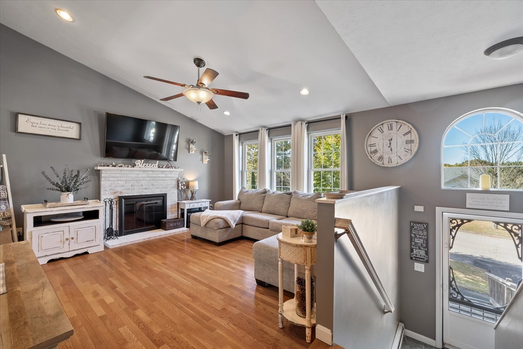 27 Ware Drive Templeton, MA 01436 - Photo 3 of 34 a living room with furniture fireplace and flat screen tv