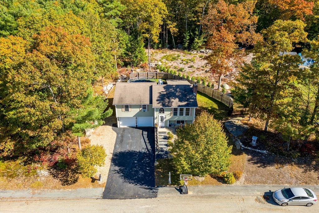 27 Ware Drive Templeton, MA 01436 - Photo 31 of 34 front view of a house with a yard