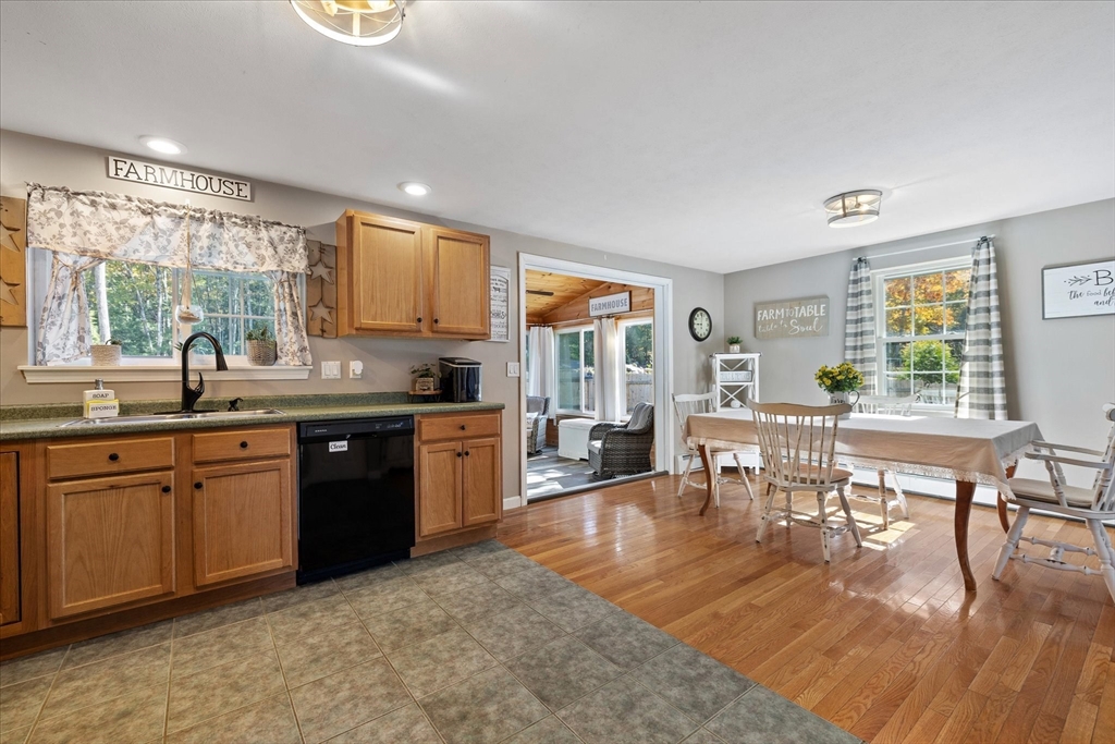 27 Ware Drive Templeton, MA 01436 - Photo 8 of 34 a kitchen with stainless steel appliances granite countertop sink stove top oven and cabinets