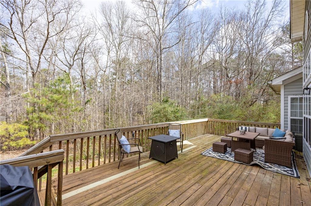 7387 Milam Road Winston, GA 30187 - Photo 33 of 41 a view of roof deck with furniture