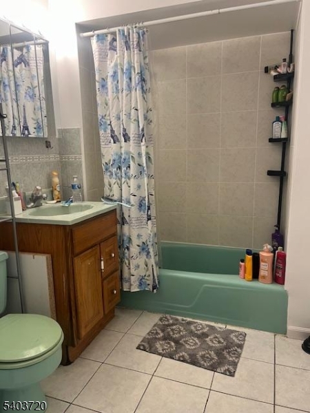 43 Patterson Street Newark, NJ 07105 - Photo 4 of 15 a bathroom with a sink toilet and a shower