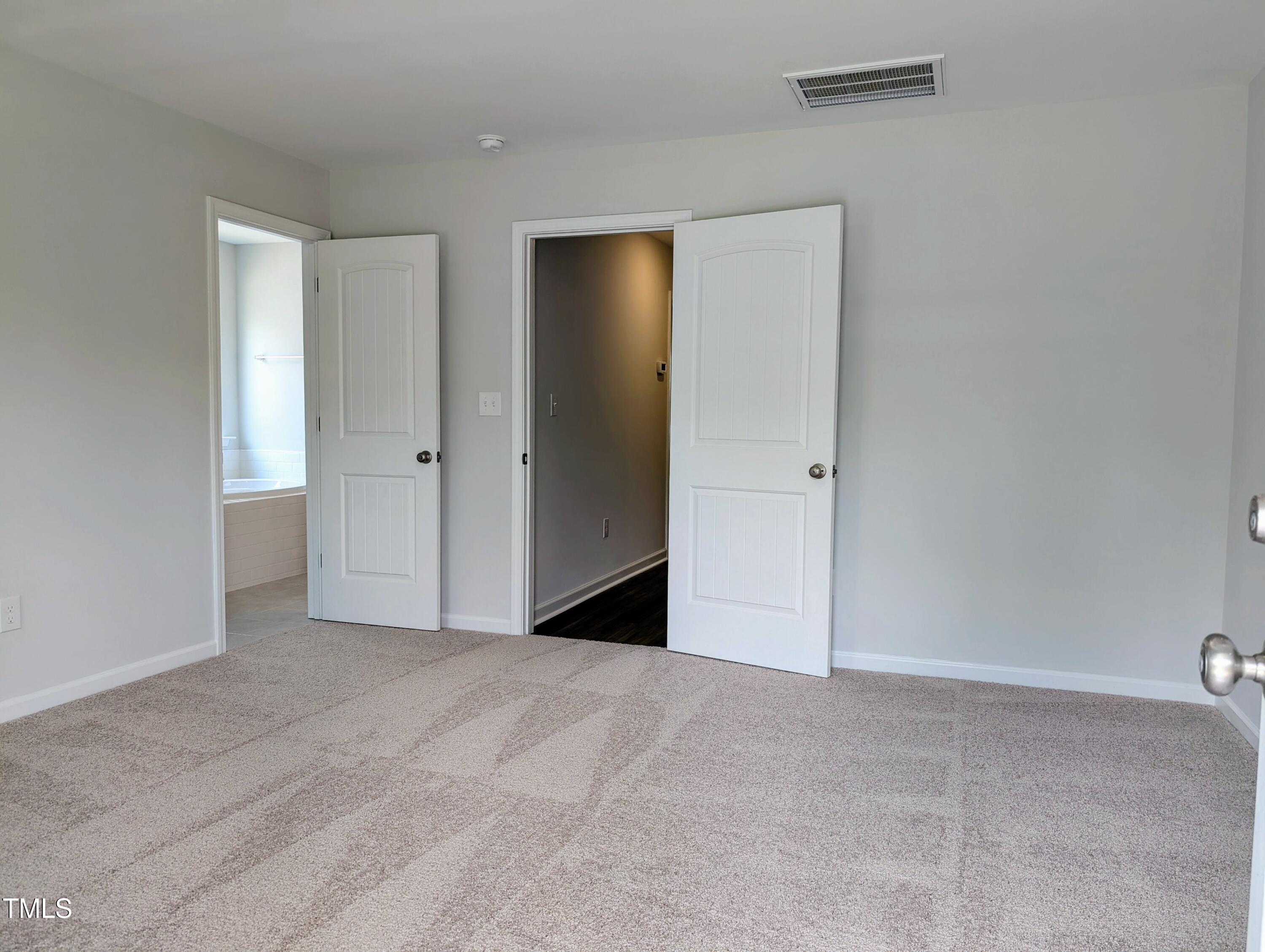9224 Leaning Post Road, Unit 445 Wake Forest, NC 27587 - Photo 19 of 28 Primary Bedroom w/EnSuite Bath