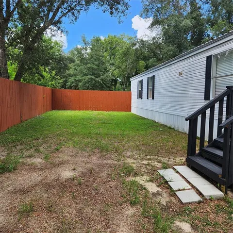 a view of a backyard with a garden