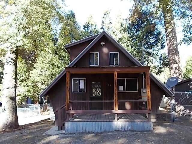 179 Rabbit Foot Trail California Hot Springs, CA 93207 - Photo 1 of 9 a front view of a house with garden