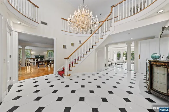 a spacious bedroom with a bed and window