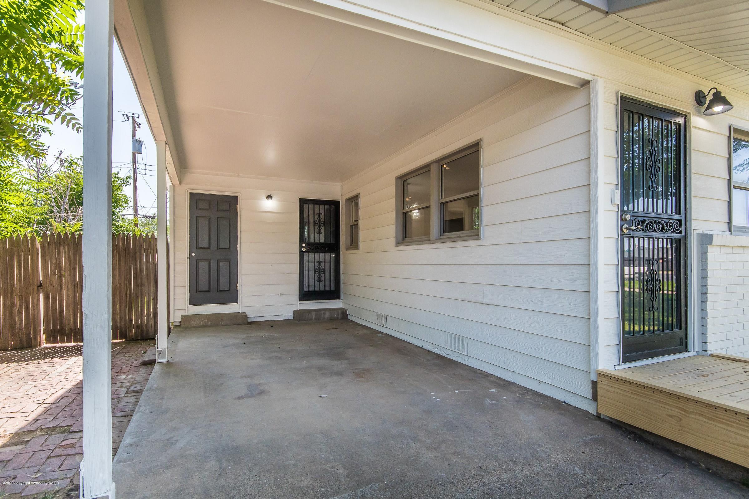 5135 Bowie Street Amarillo, TX 79110 - Photo 21 of 24 a view of a big room with closet and windows