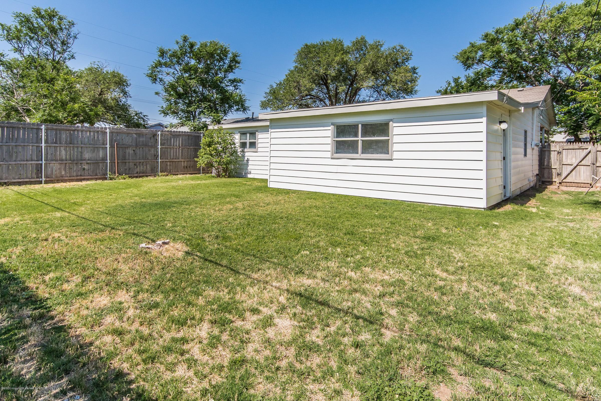 5135 Bowie Street Amarillo, TX 79110 - Photo 23 of 24 a view of a backyard with a garden and plants