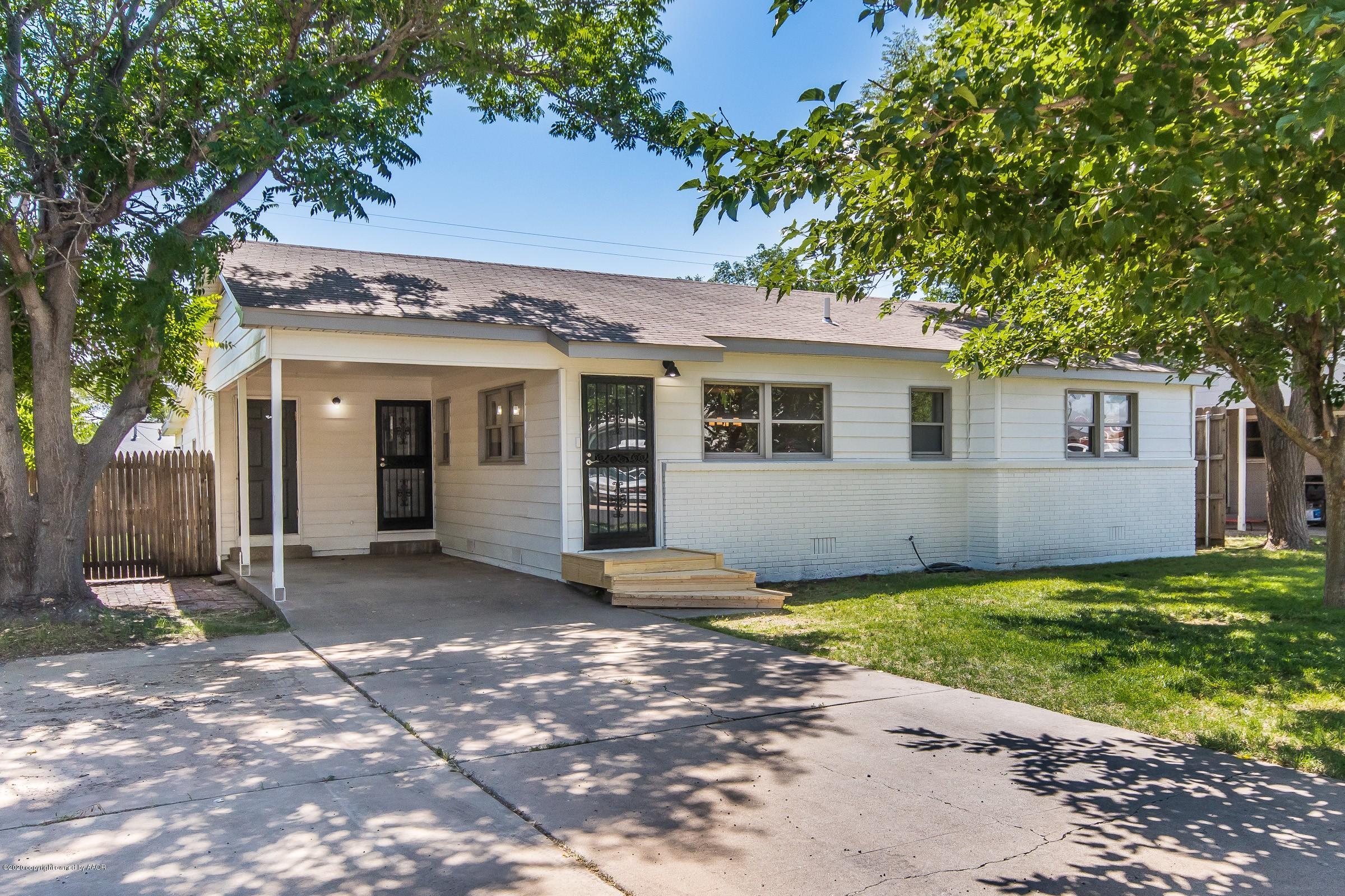 5135 Bowie Street Amarillo, TX 79110 - Photo 24 of 24 a view of a house with a yard