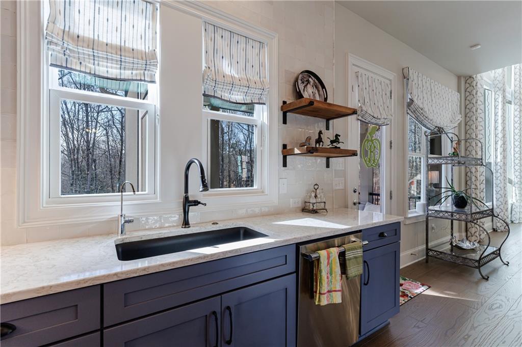 3085 Gray Hawk Lane Roswell, GA 30076 - Photo 21 of 99 a bathroom with a sink and a window