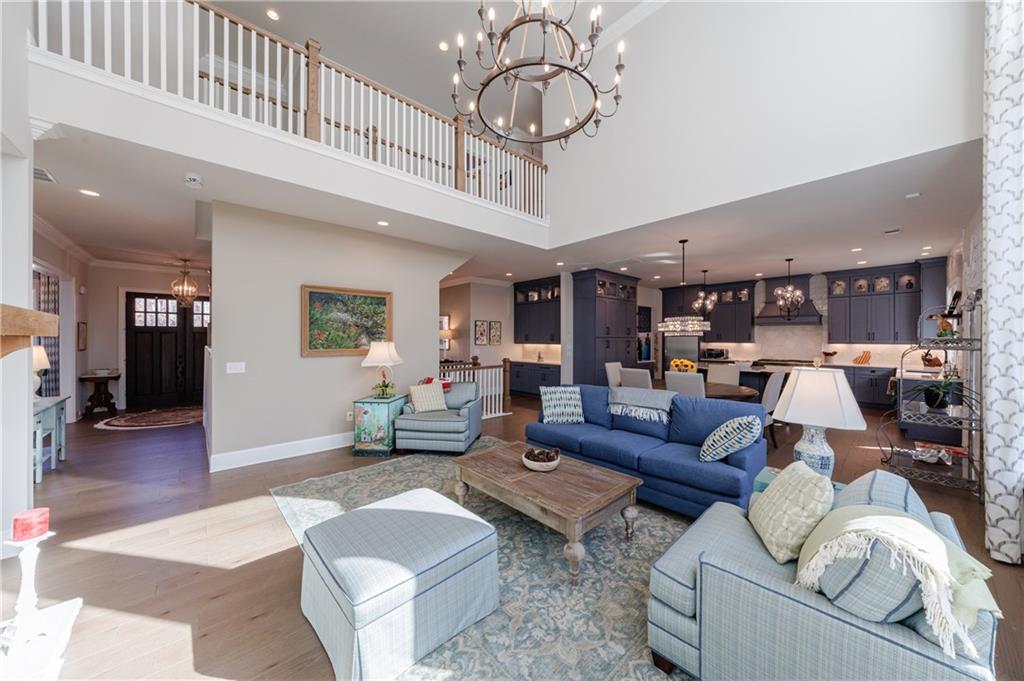 3085 Gray Hawk Lane Roswell, GA 30076 - Photo 31 of 99 a living room with furniture or kitchen view and a wooden floor