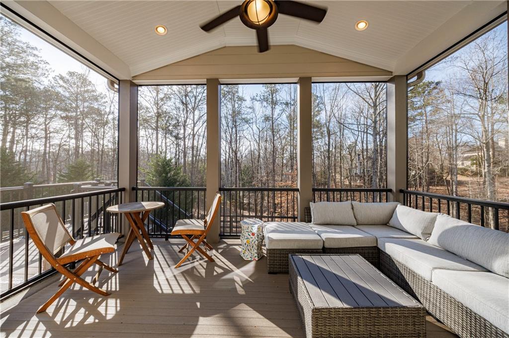 3085 Gray Hawk Lane Roswell, GA 30076 - Photo 33 of 99 a living room with furniture and a floor to ceiling window