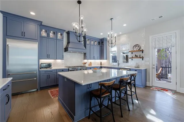 a living room with furniture a window and a table