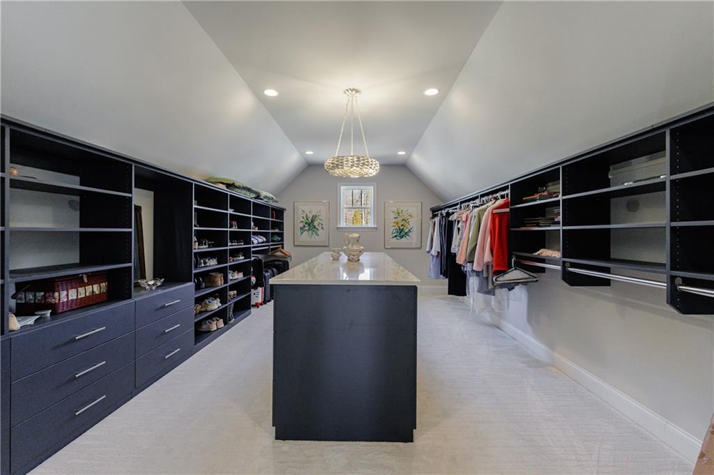3085 Gray Hawk Lane Roswell, GA 30076 - Photo 53 of 99 a view of a livingroom with furniture and a ceiling fan