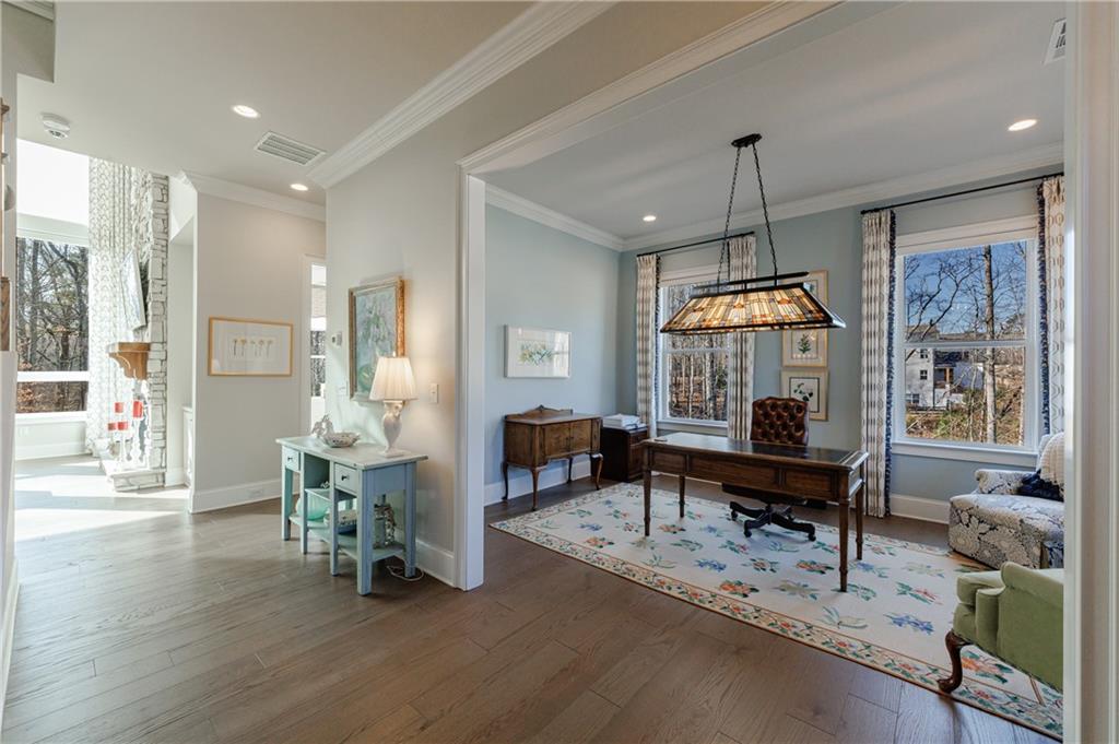 3085 Gray Hawk Lane Roswell, GA 30076 - Photo 7 of 99 a living room with furniture a window and a table