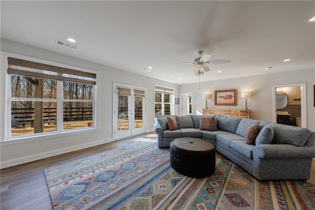 3085 Gray Hawk Lane Roswell, GA 30076 - Photo 71 of 99 a living room with furniture and a window