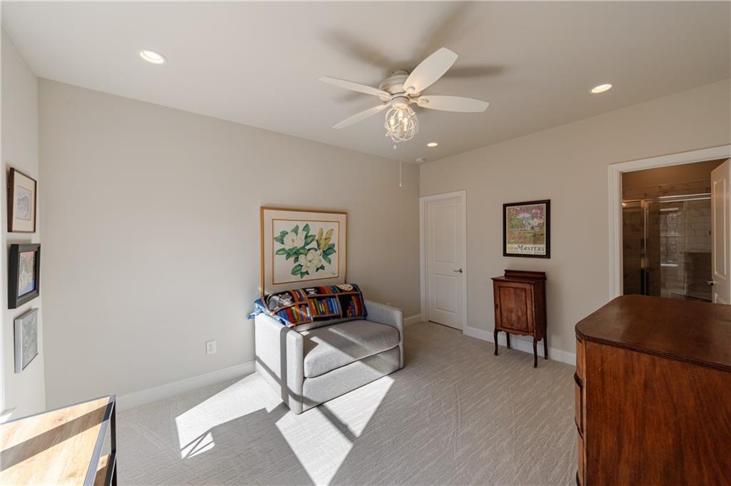 3085 Gray Hawk Lane Roswell, GA 30076 - Photo 75 of 99 a view of a workspace with furniture and wooden floor