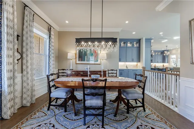 a kitchen with granite countertop stainless steel appliances and wooden cabinets
