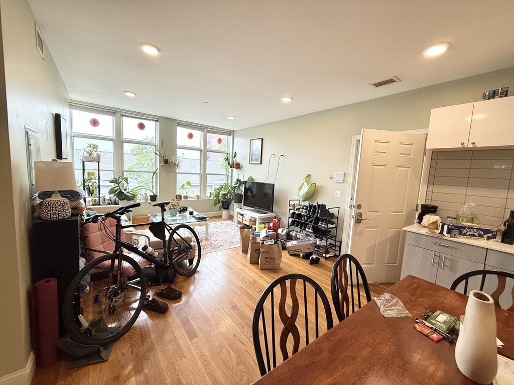 299 Dudley Street, Unit 5 Boston, MA 02119 - Photo 3 of 8 a view of a dining room with furniture window and outside view