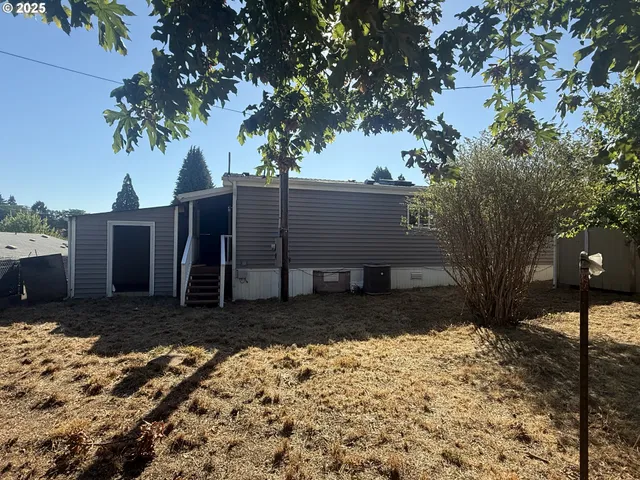 a view of a backyard of a house