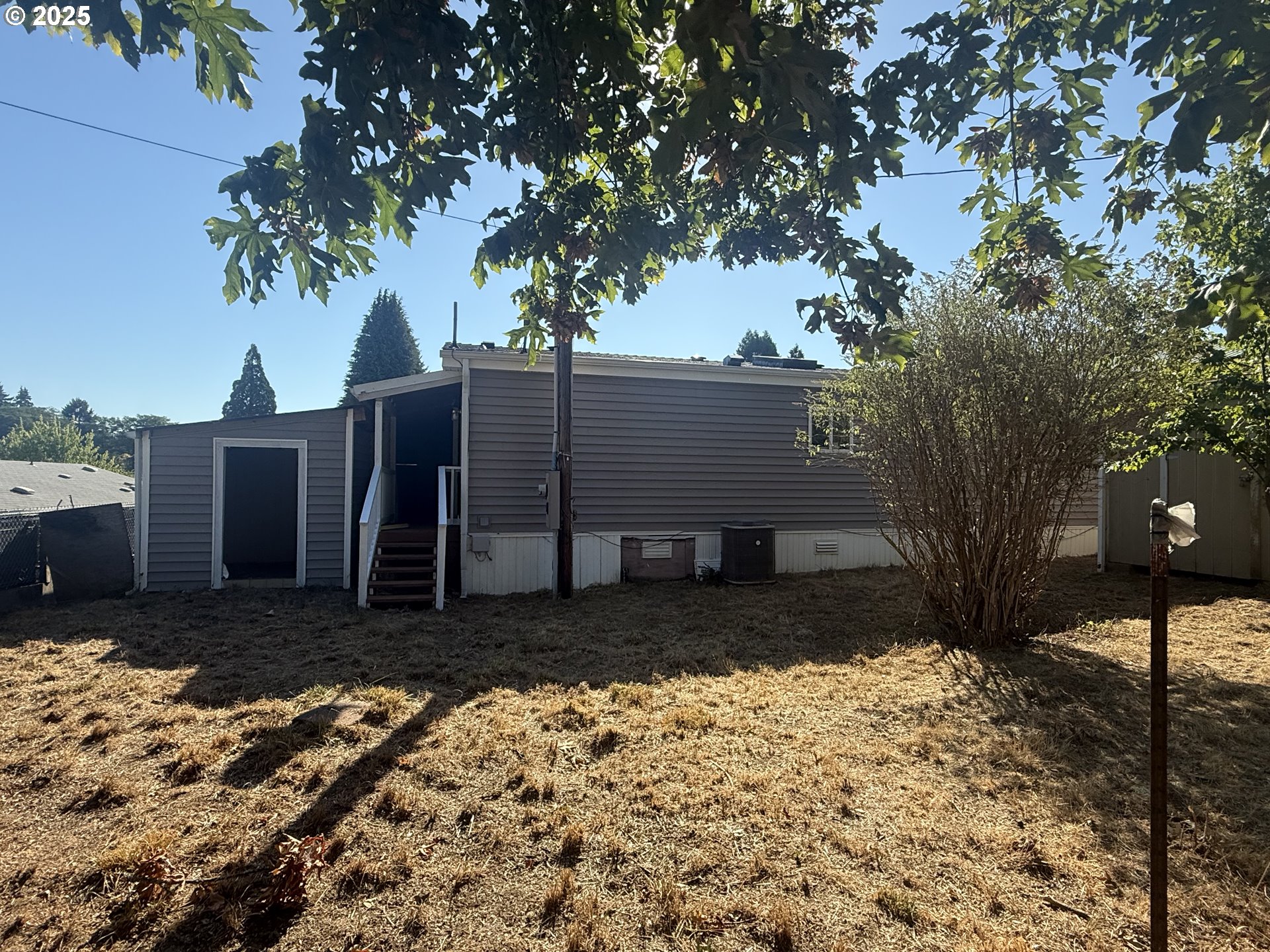 373 Hayhurst Road Yoncalla, OR 97499 - Photo 18 of 33 a view of a backyard of a house