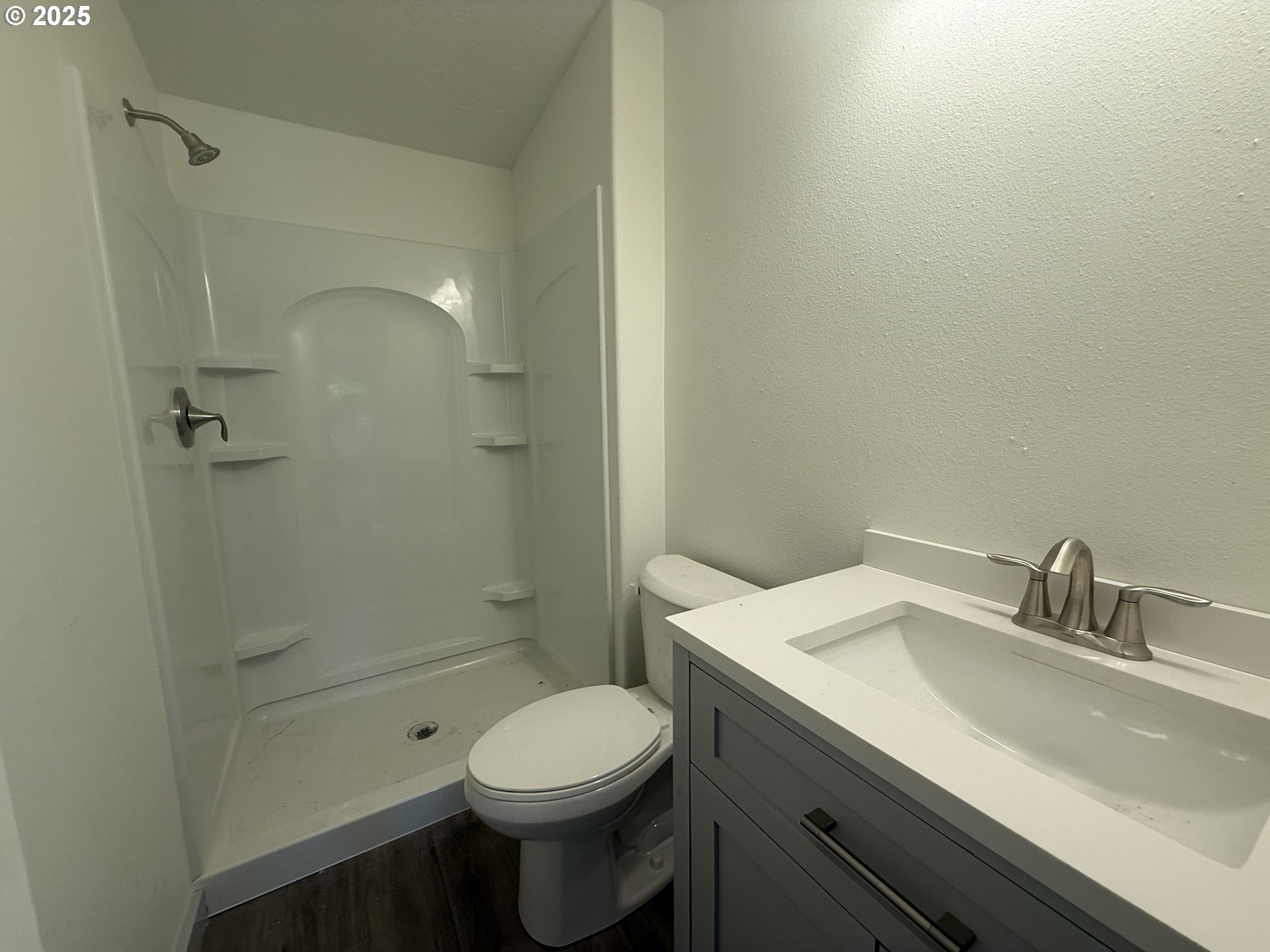 373 Hayhurst Road Yoncalla, OR 97499 - Photo 21 of 33 a bathroom with a sink a toilet and shower