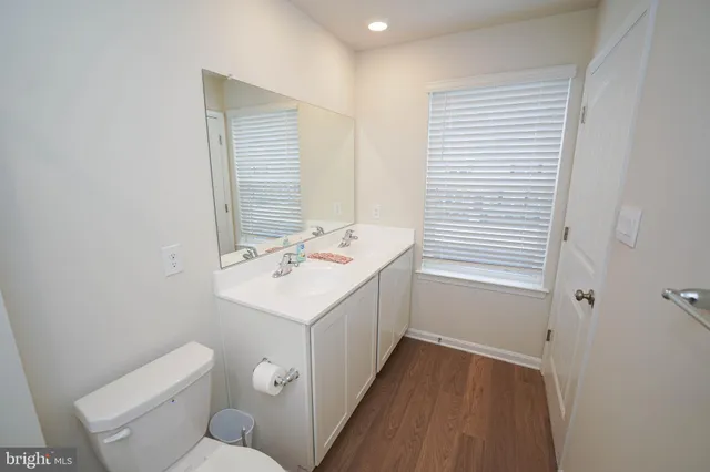 a bathroom with a bathtub a toilet and a shower