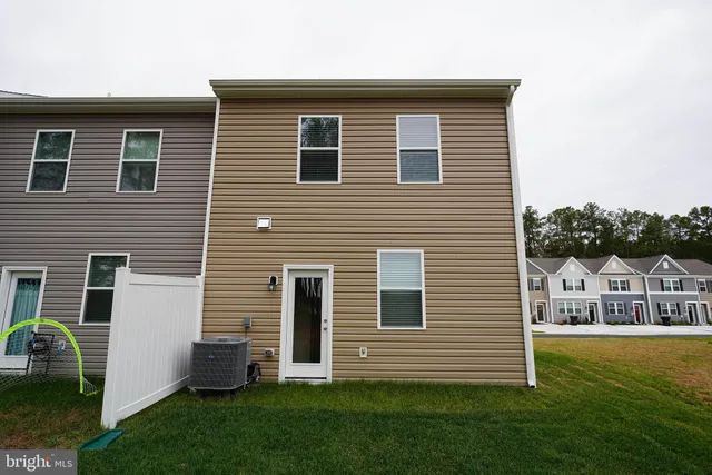 a front view of house with yard