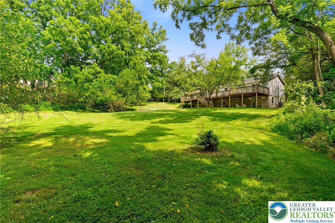 2007 Springtown Hill Road Hellertown, PA 18055 - Photo 12 of 100 a backyard of a house with outdoor seating and green space