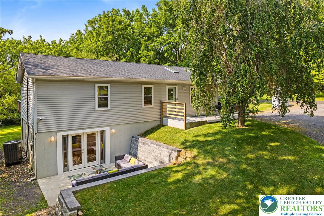 2007 Springtown Hill Road Hellertown, PA 18055 - Photo 14 of 100 a view of a house with backyard and a tree