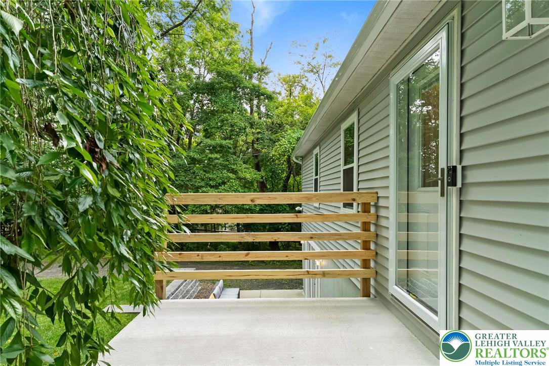 2007 Springtown Hill Road Hellertown, PA 18055 - Photo 20 of 100 a view of backyard with deck and outdoor seating