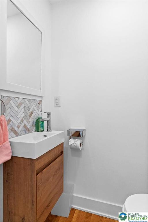 2007 Springtown Hill Road Hellertown, PA 18055 - Photo 28 of 100 a bathroom with a sink a toilet and vanity