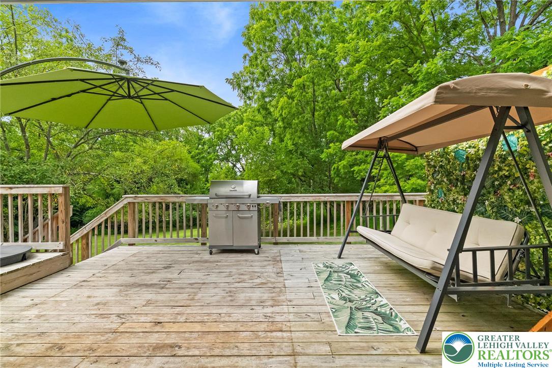 2007 Springtown Hill Road Hellertown, PA 18055 - Photo 36 of 100 a view of a deck with a chair and table