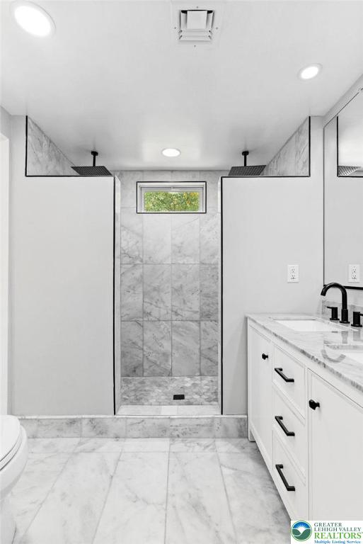 2007 Springtown Hill Road Hellertown, PA 18055 - Photo 46 of 100 a bathroom with a granite countertop sink a toilet and shower
