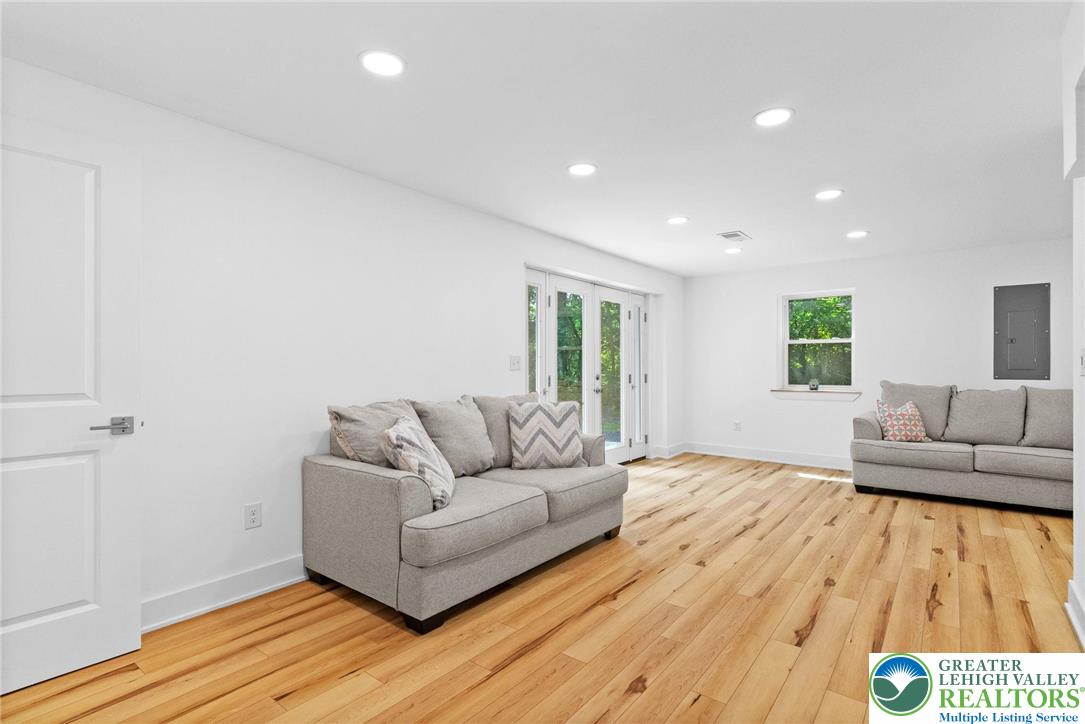 2007 Springtown Hill Road Hellertown, PA 18055 - Photo 64 of 100 a living room with a couch and a wooden floor