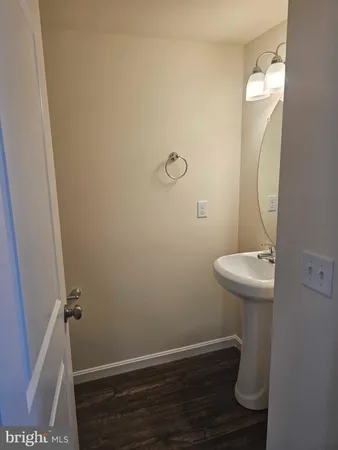 a bathroom with a sink and toilet