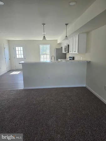 a view of kitchen and window